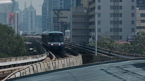 Skytrain BTS moving in center of Bangkok Stock Footage 335567663