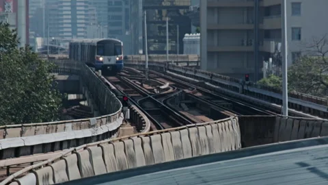 Skytrain BTS moving in center of Bangkok Stock Footage 335567914