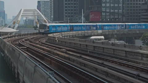 Skytrain BTS moving in center of Bangkok Stock Footage 335569099