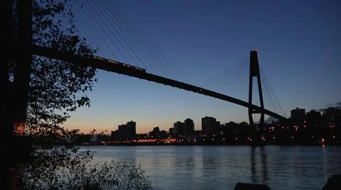 Skytrain at night crossing the bridge Stock Footage 4760071