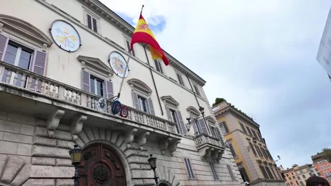 Skyward Facade with Spanish Flag Stock Footage 273177266