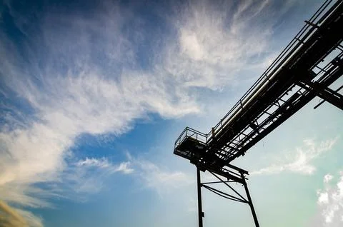 Skyward Path Low Angle View of Industrial Walkway in Gravel Quarry. Walkway t Stock Photos