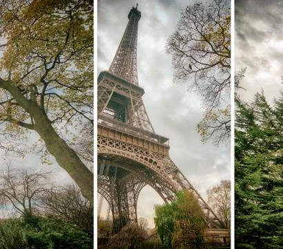 Skyward view of Eiffel Tower on a cloudy winter day - France Stock Photos