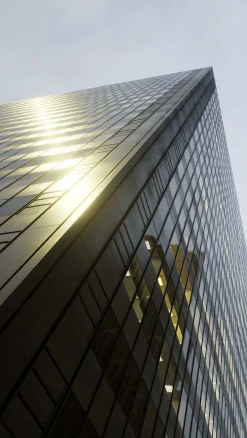Skyward view of modern building reflecting light in urban setting Stock Footage 336166490