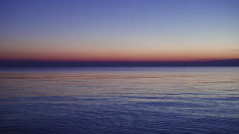 Sky/Water Reflection at Sunrise Stock Footage 147713605