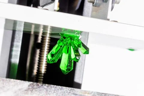 SLA technology 3D printer. Resin crystal product printed on 3D printer. Close-up Stock Photos