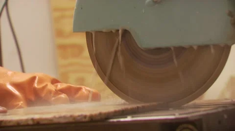 Slab of granite being cut with circular saw Stock Footage 55570163
