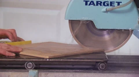 Slab of granite being cut with circular saw Stock Footage 55570654