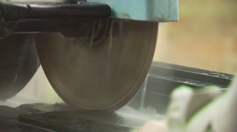 Slab of granite being cut with circular saw Stock Footage 55570900