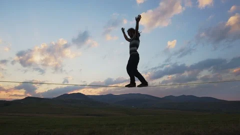 Slack line walking on slackline Stock Footage 121868510