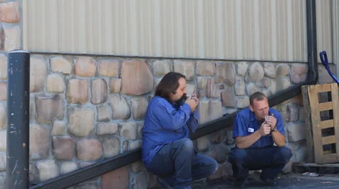 Slackers On A Smoke Break Stock Footage