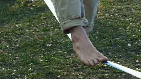 Slackline slacklining The man walks by the rope. Stock Footage 105170022