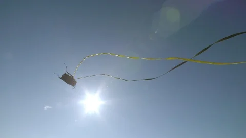 Slackliner throws line and bag into a valley in slow motion Stock Footage 90818940