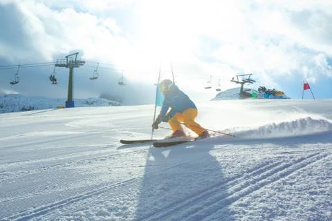 Slalom Skier attacks a gate Stock Photos