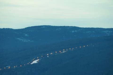 A slalom treck illuminated in forest. Stock Photos