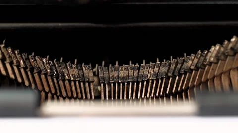 Slamming type bars of a typewriter Stockbeeldmateriaal 50507655