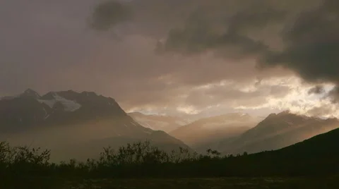 Slanting Sunlight Rays in Distant Cloudy Mountains Stock Footage 41394037