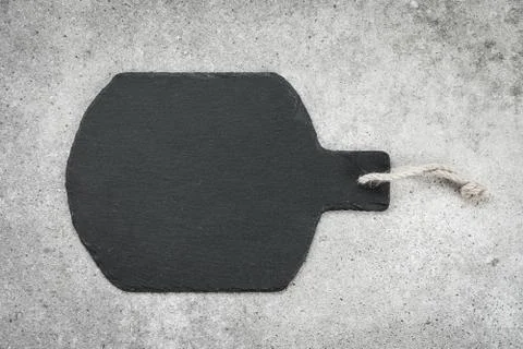 Slate on black stone background Stock Photos