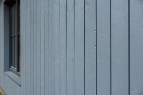 Slate Blue Vertical Wooden Cladding with Dark Window Trim Detail Stock Photos