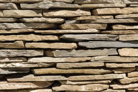 Slate flagstone wall ancient stone texture and background Stock Photos