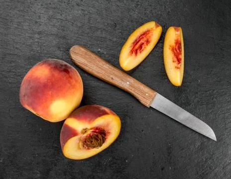 Slate slab with Peaches Stock Photos