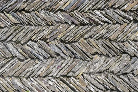 Slate slabs stacked in a herringbone pattern to form a wall Full size Cornwall Stock Photos