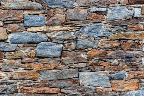 Slate slabs texture background. Pattern of black slate wall Stock Photos