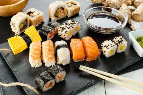 Slate tray of assorted sushi Stock Photos