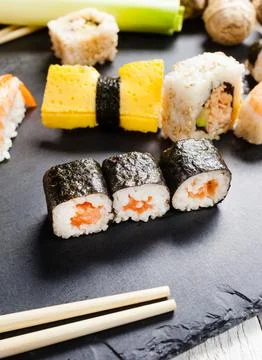 Slate tray of assorted sushi Fotos de archivo