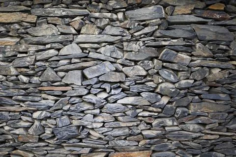 Slate wall texture and background . bricks slate texture background, slate .. Stock Photos