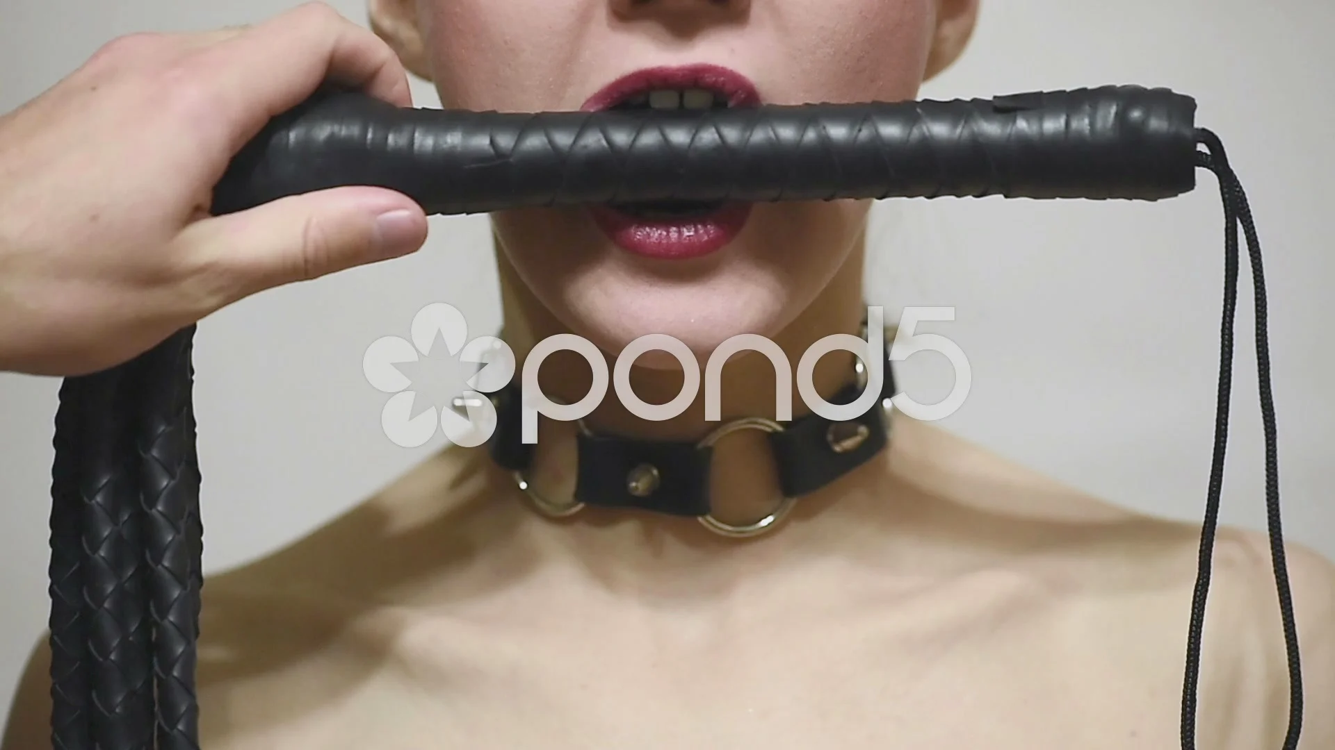 https://images.pond5.com/slave-attractive-woman-whip-mouth-057775717_prevstill.jpeg