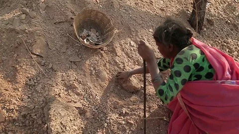 Slavery in Asia. Unskilled workers. Mining of mica. India. Stock Footage 77630153