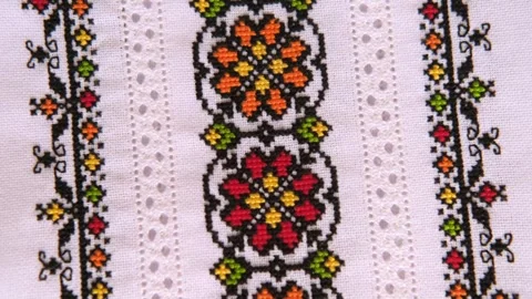 Slavic cross stitch by colored threads. Design of ethnic pattern with Embroidery Stock Footage 250417827