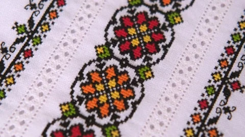 Slavic cross stitch by colored threads. Design of ethnic pattern with Embroidery Stock Footage 254000834