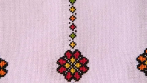 Slavic cross stitch by colored threads. Design of ethnic pattern with Embroidery Stock Footage 262569886
