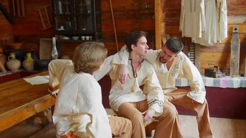 Slavic guys communicate in an old house. Stock Footage 233174983