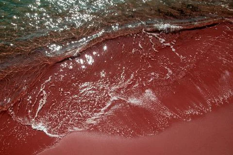 Сlear ocean wave on sandy beach, sea ​​wave texture, unusual water background Stock Photos