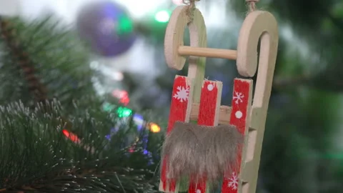 Sled on the Christmas tree Stock Footage 130336806