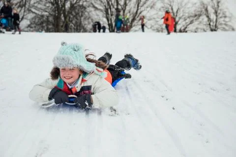 Sledding in the Park Stockfoto's