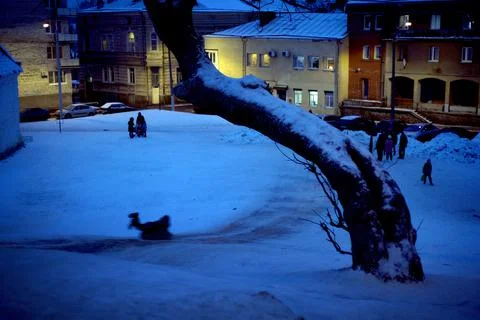 Sledding off a snow slide. Foto stock