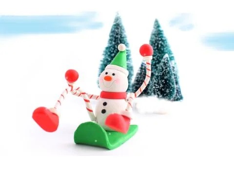Sledding snowman Stock Photos