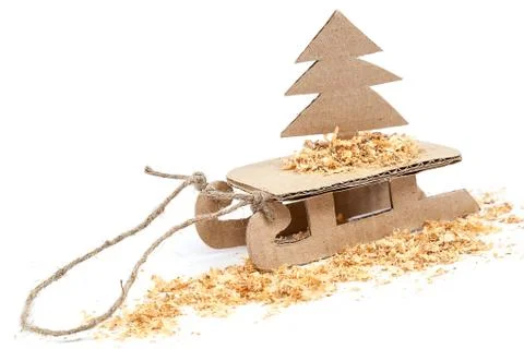 Sledge with Christmas tree on white background. Stock Photos
