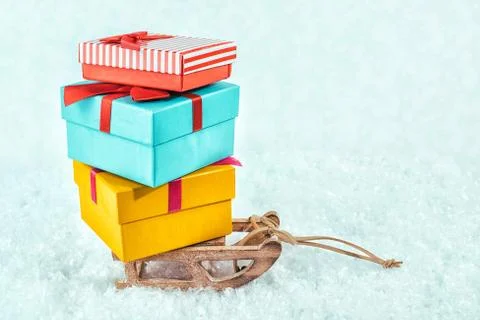 Sledge on snow with presents. Stock Photos