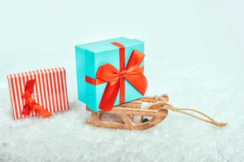 Sledge on snow with presents. Stock Photos