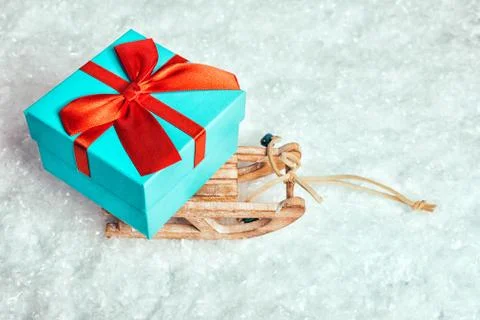 Sledge on snow with presents. Stock Photos