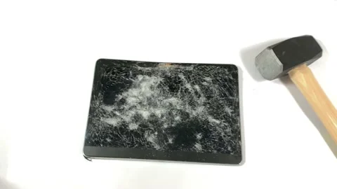 Sledgehammer Dropped on Smashed Digital Tablet Stock Footage 150265116