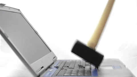 A sledgehammer drops on a laptop Video stock 150636223