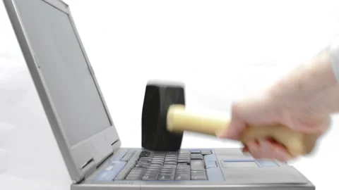 A sledgehammer hammering a laptop Video stock 150637988