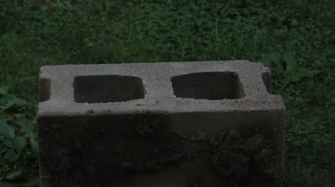 Sledgehammer Striking Cinderblock in Different Places Stock Footage 68853759