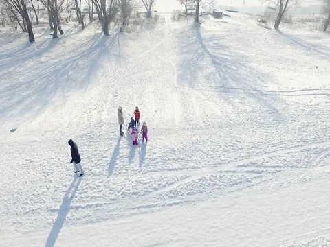 Sleding on a slopes in suburban Stock-Footage 83531358